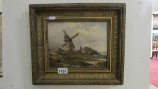 An oil on board featuring a windmill initialled J R T (Nottingham artist John Richard Townsend