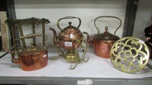 2 copper kettles on brass trivets and a copper kettle on stand with burner