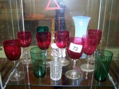 Quantity of glassware inc. cranberry vaseline, top hat match striker etc.