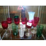 Quantity of glassware inc. cranberry vaseline, top hat match striker etc.