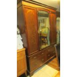 A mahogany combination wardrobe