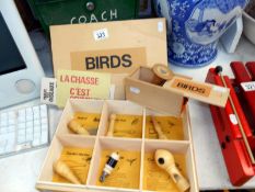 2 boxes of bird whistles