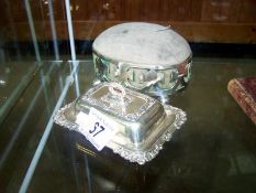 An epns pin cushion box named inside 'The Florence' and a plated butter dish