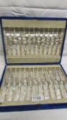 A cased set of 12 silver and mother of pearl knives and forks (24 pieces in total) HM Sheffield