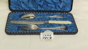 A Victorian cased christening set being knife fork and spoon