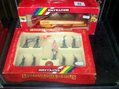 Set of Britains US marine corps figure and a round bale wagon