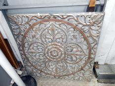 A decorative pressed steel panel