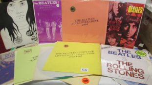 A collection of Beatles unofficial albums some vinyl in different colours including Hollywood Bowl,