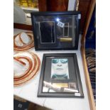 A Matrix reloaded framed film cell & a Matrix revolutions film cell,