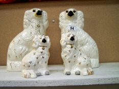 Pair of Beswick Staffordshire dogs and 1 other pair