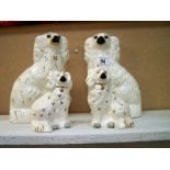 Pair of Beswick Staffordshire dogs and 1 other pair