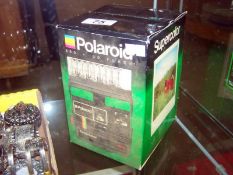 A boxed Polaroid supercolour 600