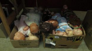 2 boxes of vintage composite and plastic dolls