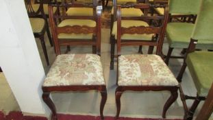 A pair of mahogany inlaid chairs