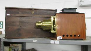 A rare magic lantern slide project with wooden body and in wooden case