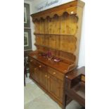 A solid pine 3 drawer 3 door dresser