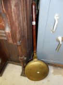 A Victorian brass & copper bed warming pan
