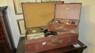 A large quantity of film reels in 2 suitcases including Popeye, The Hills of Kentucky,