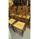 A set of 4 oak ladderback chairs
