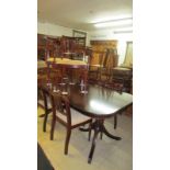 A mahogany table and 6 chairs