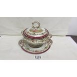 A Victorian sauce tureen with cover and stand