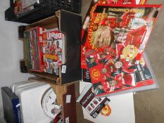 A large collection of Manchester United ephemera, medallion collections, club history,