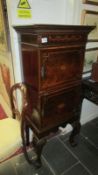 A mahogany inlaid cabinet