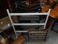 A dark wood stained book shelves with integral magazine rack & a clothes horse & specimen shelves