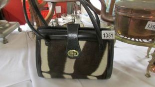 A Zebra skin hand bag circa 1950's with double hand strap