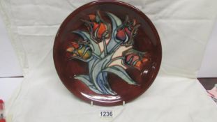 A Moorcroft Sally Tuffin tulip design plate