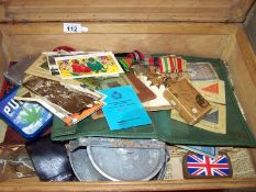 An original soldiers de-mob case and contents including medals and fuel ration book etc.