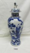 An Oriental blue and white lidded vase