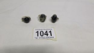 3 silver rings being 2 black onyx and 1 moss agate