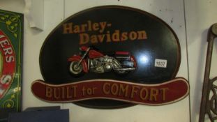 A Harley Davidson painted wall plaque