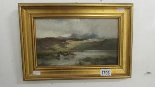 An oil on board rural scene featuring cattle wading in river initialled J R T (Nottingham artist