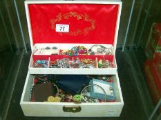 White jewellery box of costume jewellery