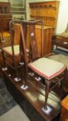A pair of Edwardian inlaid bedroom chairs
