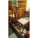 A pair of Edwardian inlaid bedroom chairs