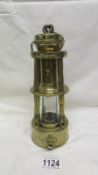A rare late 19th century all brass miner's lamp by Davis of Derby