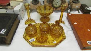 An amber glass dressing table set and sweetmeat dish