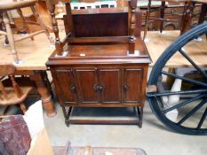 A 1920s oak gramophone cabinet (empty)