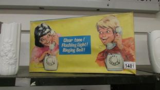 A boxed vintage child's telephone set