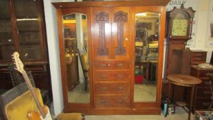 An Edwardian combination wardrobe