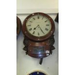 A drop dial Fusee wall clock with mother of pearl inlay and carved decoration, face marked Upton,
