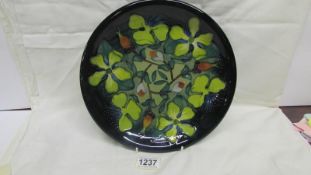 A Moorcroft Hypericum charger, Rachel Bishop design,