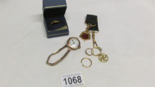 5 gold items including a 9ct gold watch and one other item