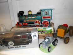 Boxed tinplate train, Mettoy tractor,