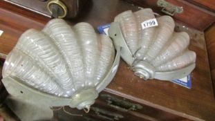 A pair of Art Deco clam wall lights