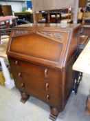 A 1930s oak bureau