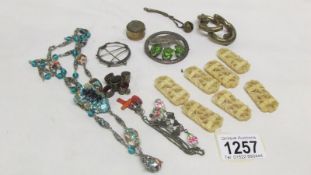 A mixed lot of costume jewellery including silver brooch set large peridot
